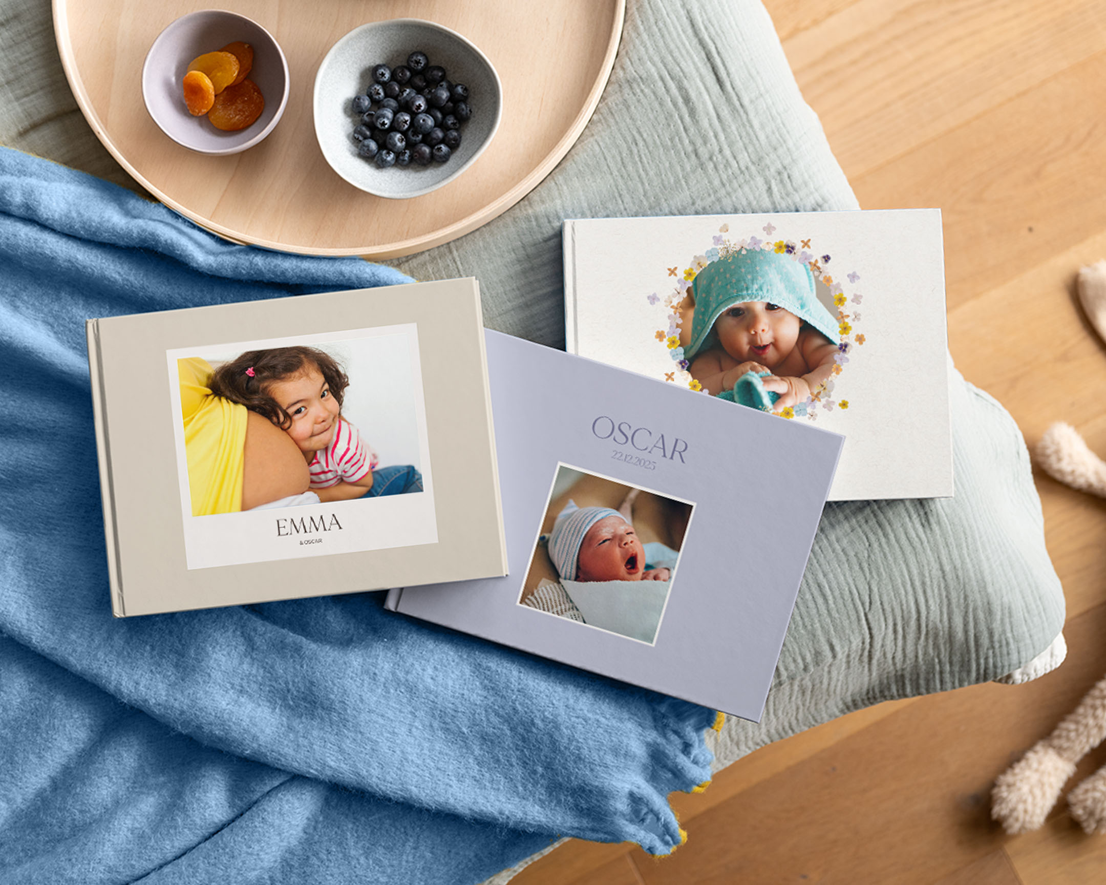 Fotolibri personalizzati per neonati con foto del neonato sulle copertine.