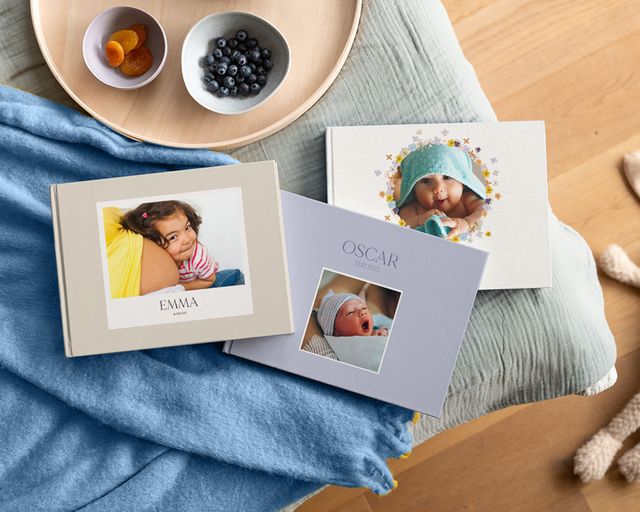 Fotolibri personalizzati per neonati con foto del neonato sulle copertine.